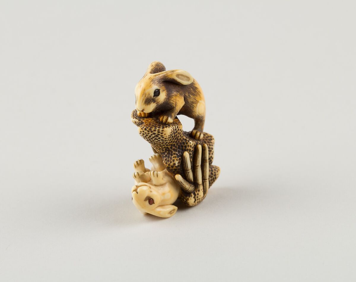 Netsuke of Two Rabbits and a Rock, Mitsuharu, Ivory; coral and horn inlay, Japan