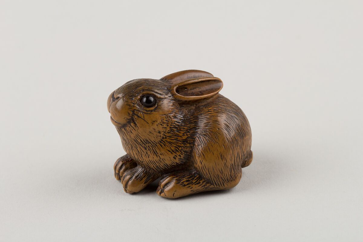 Netsuke of a Seated Hare, Minkō (Japanese, ca. 1735–1816), Wood, horn, Japan 