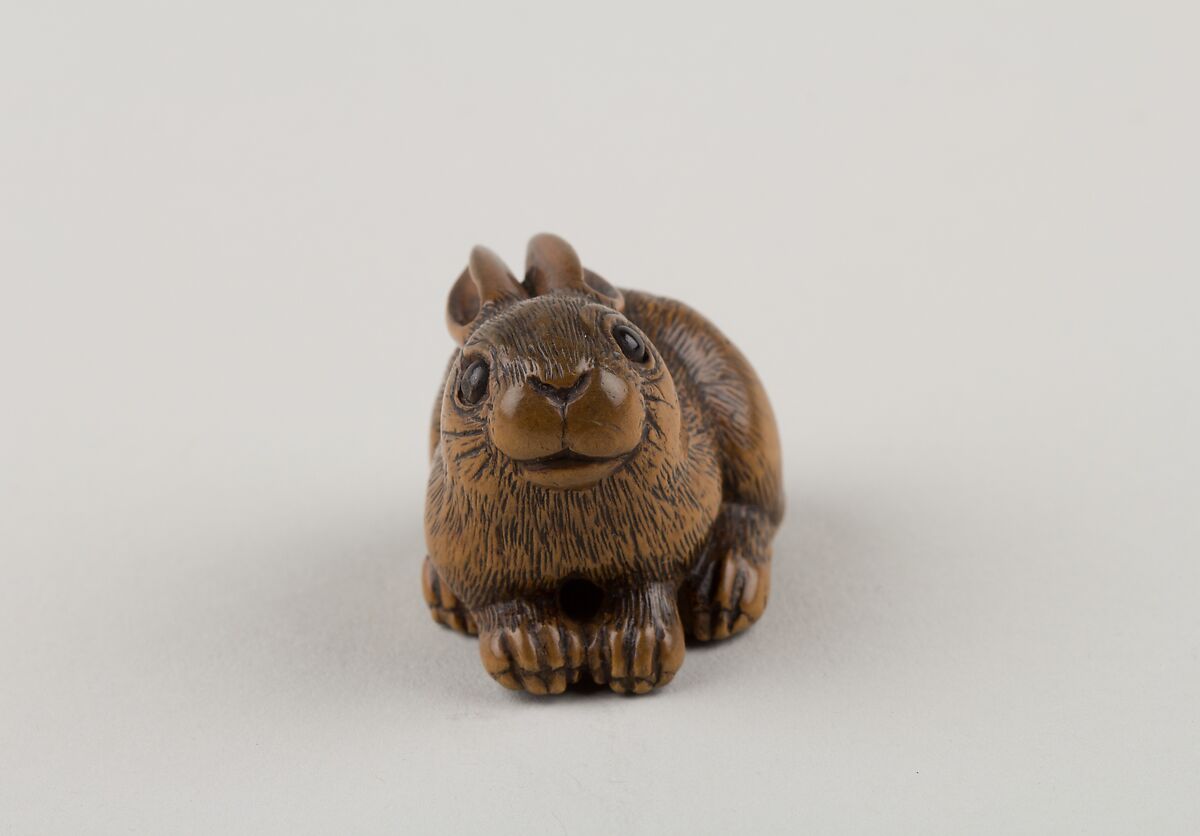 Netsuke of a Seated Hare, Minkō (Japanese, ca. 1735–1816), Wood, horn, Japan