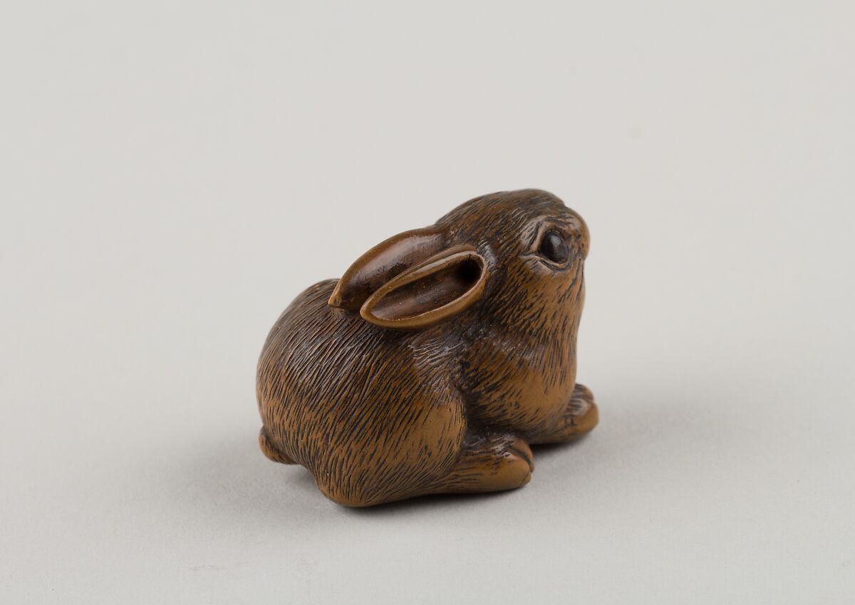 Netsuke of a Seated Hare, Minkō (Japanese, ca. 1735–1816), Wood, horn, Japan