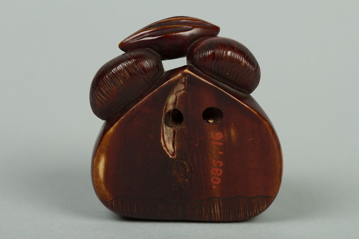 Netsuke of Chestnuts and a Fly, Ivory stained brown, Japan