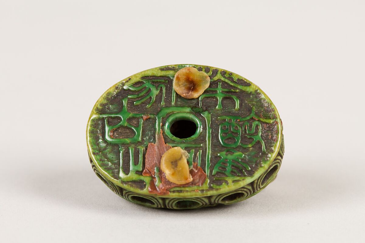 Netsuke of Fish on a Seal, Ivory stained green, Japan