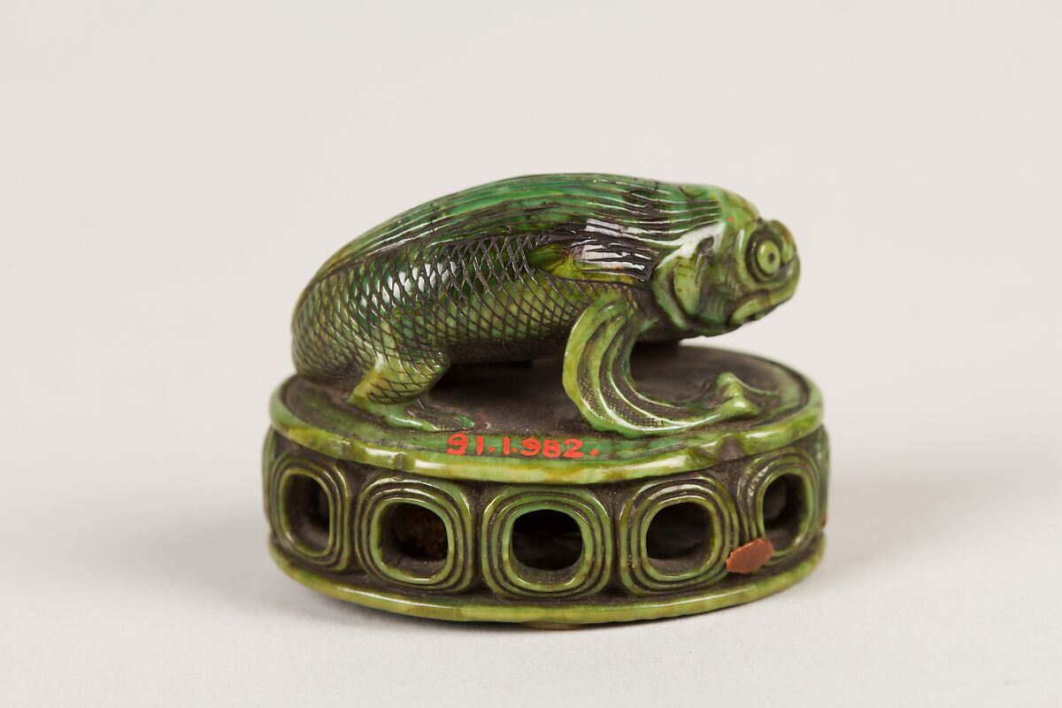 Netsuke of Fish on a Seal, Ivory stained green, Japan