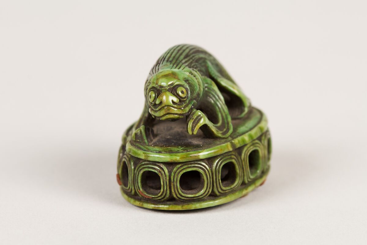 Netsuke of Fish on a Seal, Ivory stained green, Japan