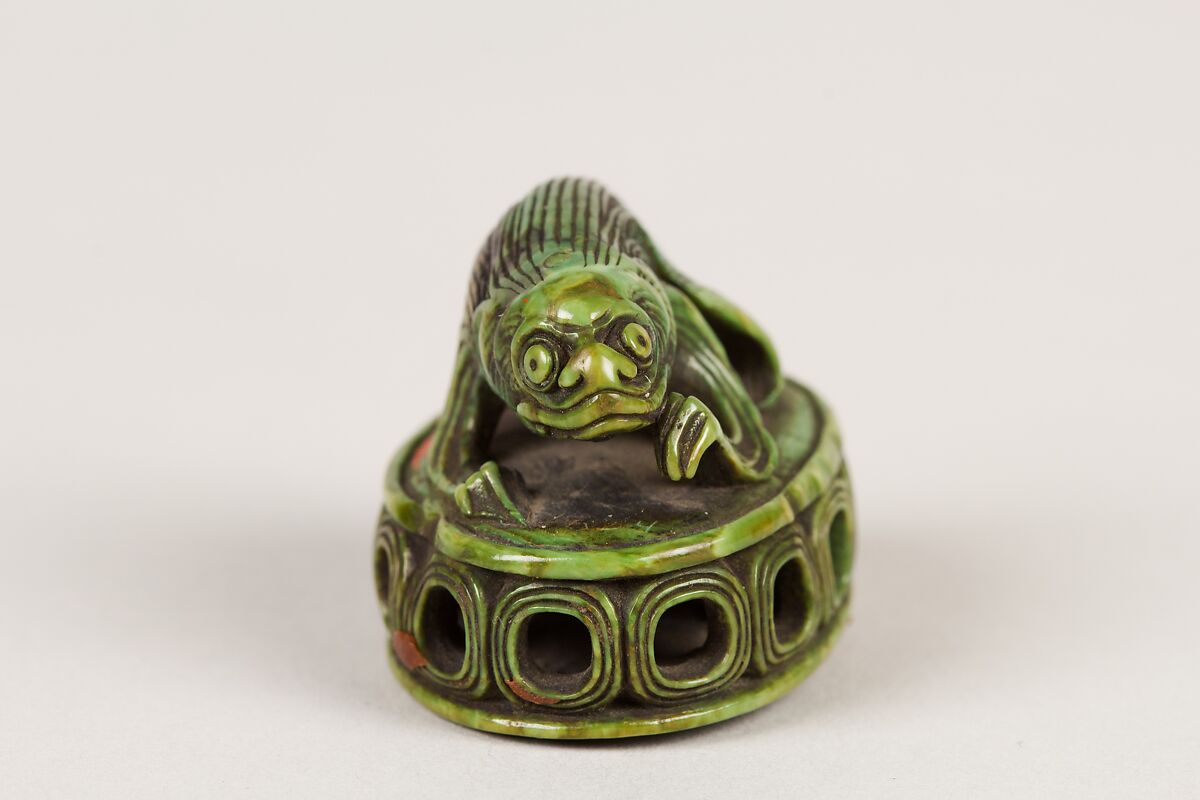 Netsuke of Fish on a Seal, Ivory stained green, Japan