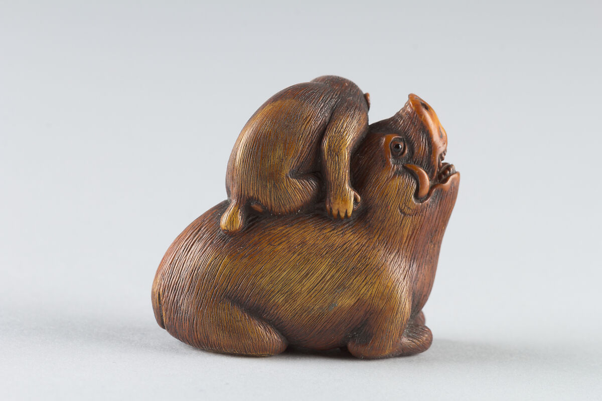 Netsuke of Monkey Attacking a Boar, Ivory-stained brown, Japan