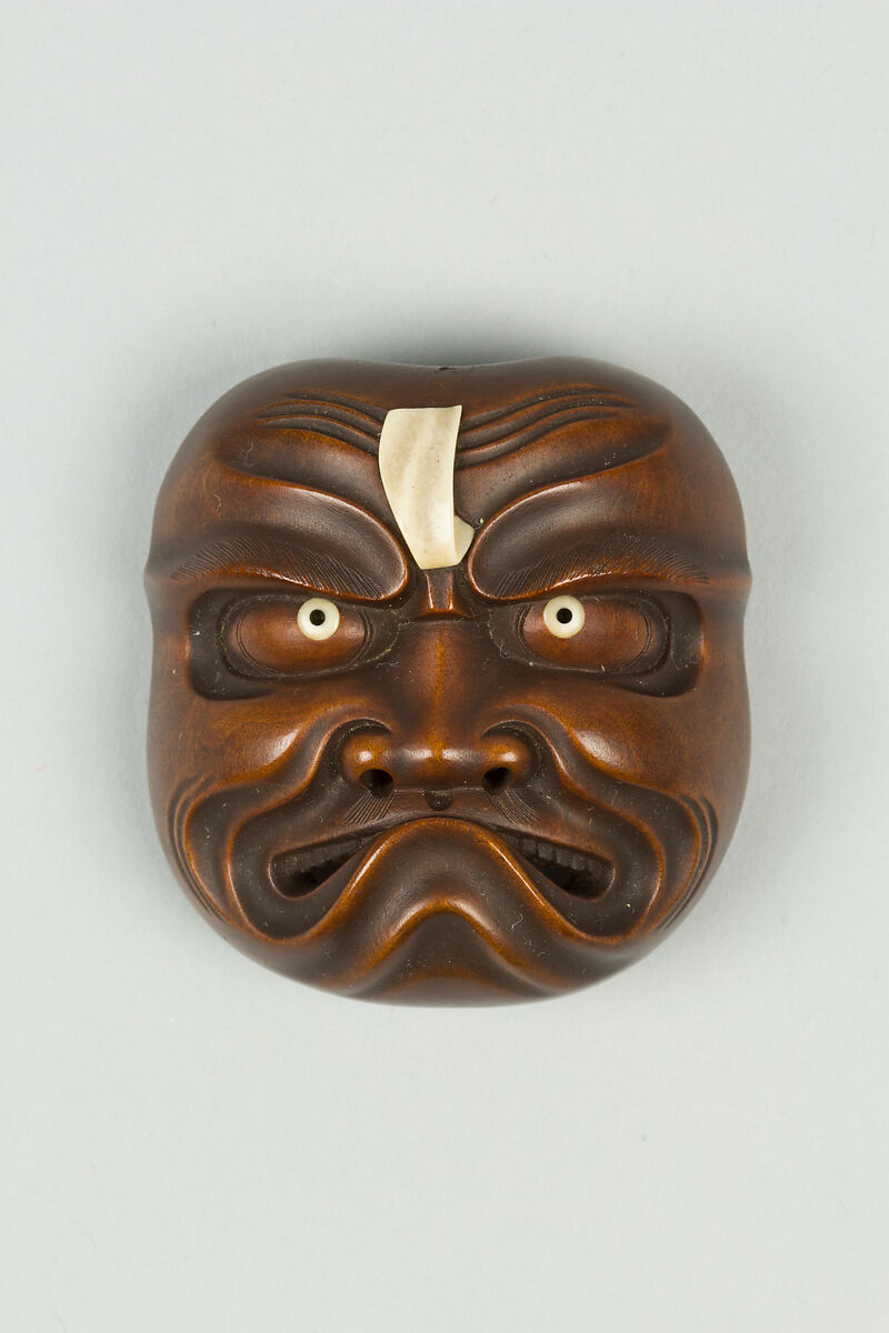 Netsuke of Demon Mask, Wood, ivory, Japan 