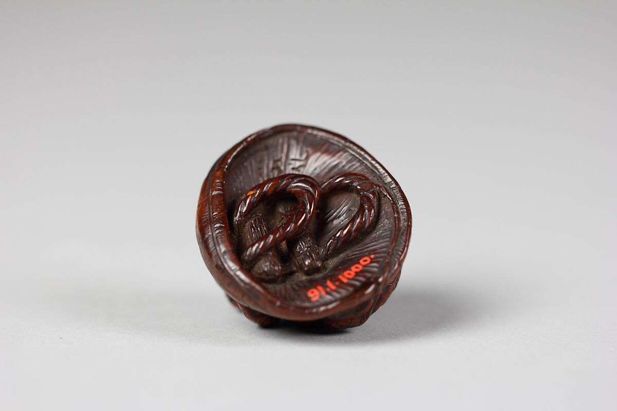 Netsuke of Frog on a Straw Hat, Wood, Japan
