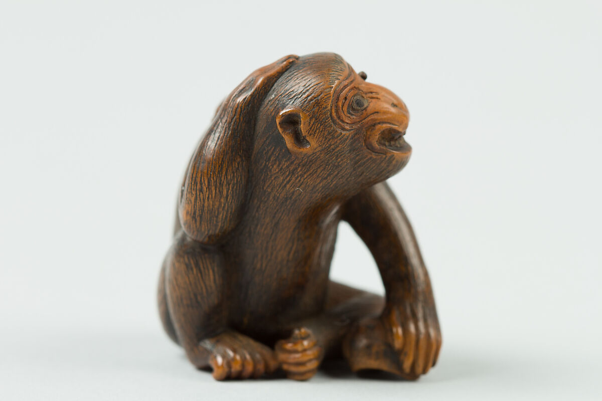 Netsuke of Monkey with a Bee on His Back, Wood, Japan 