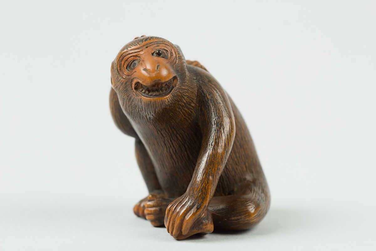 Netsuke of Monkey with a Bee on His Back, Wood, Japan