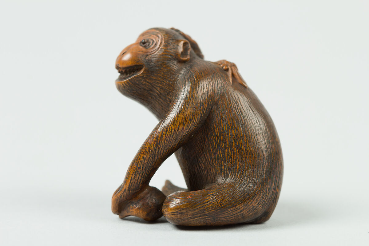 Netsuke of Monkey with a Bee on His Back, Wood, Japan
