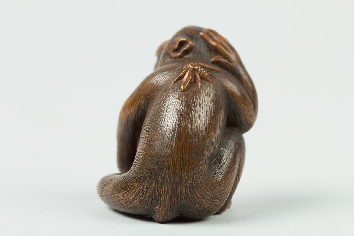 Netsuke of Monkey with a Bee on His Back, Wood, Japan