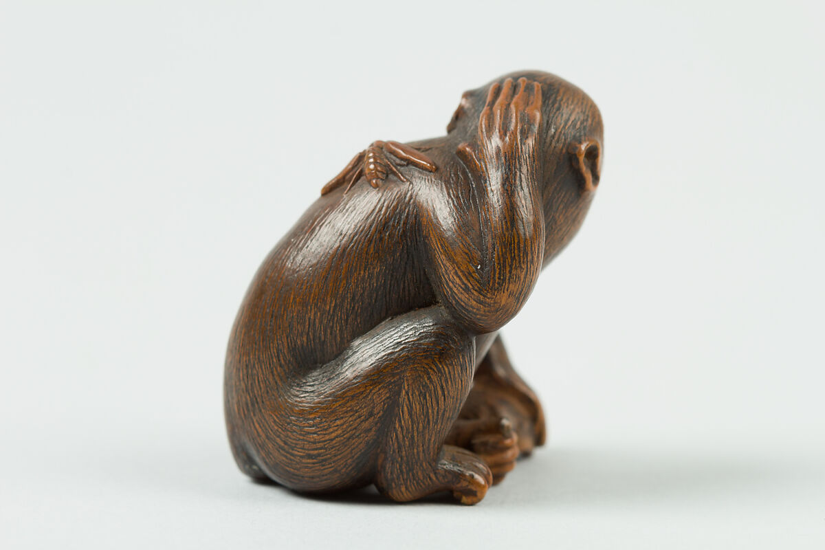 Netsuke of Monkey with a Bee on His Back, Wood, Japan