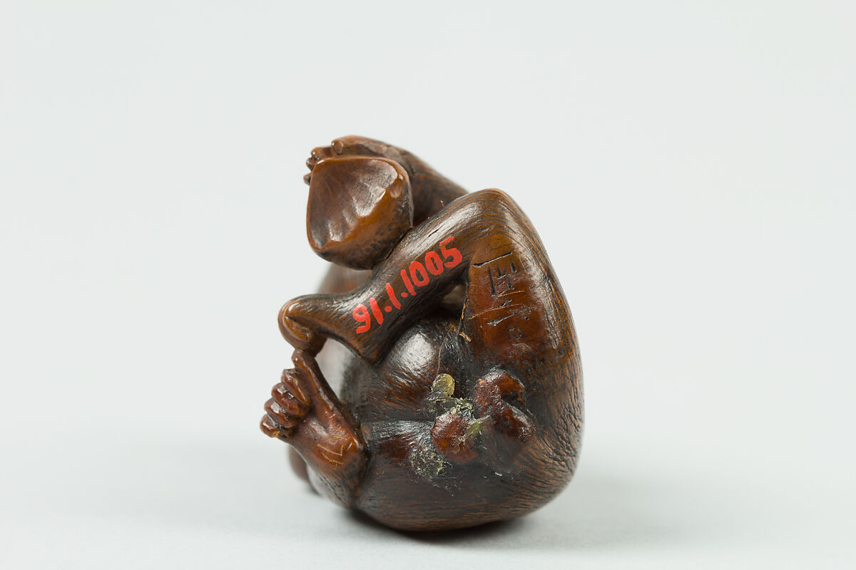 Netsuke of Monkey with a Bee on His Back, Wood, Japan