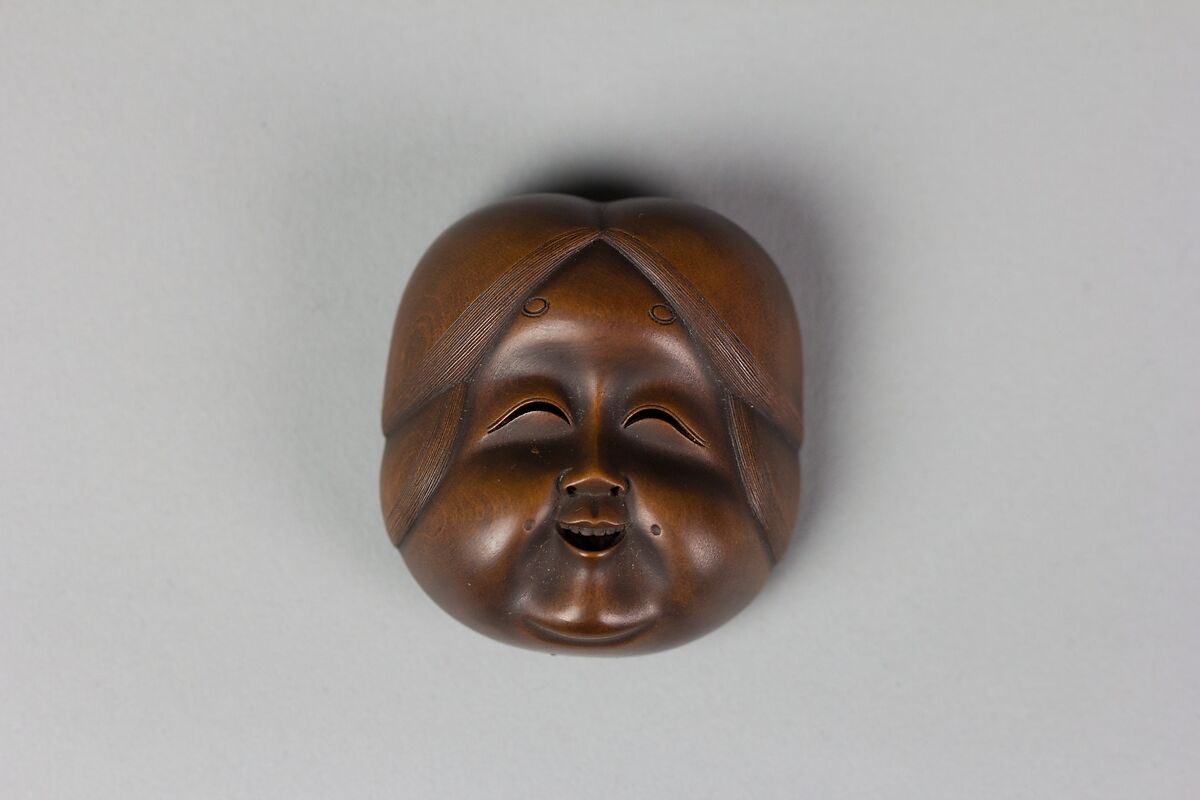 Netsuke of Kyōgen Mask: Usume (or Ofuku or Okame), Wood, Japan 