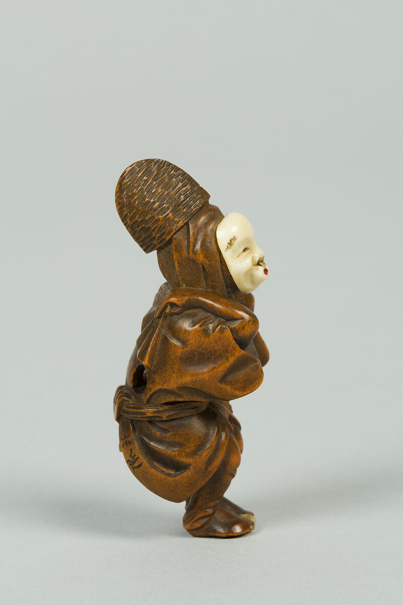 Netsuke of Boy Wearing an Ivory Mask, Wood, ivory, Japan