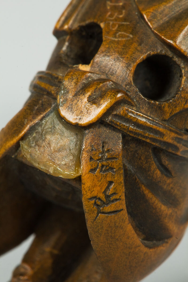 Netsuke of Boy Wearing an Ivory Mask, Wood, ivory, Japan