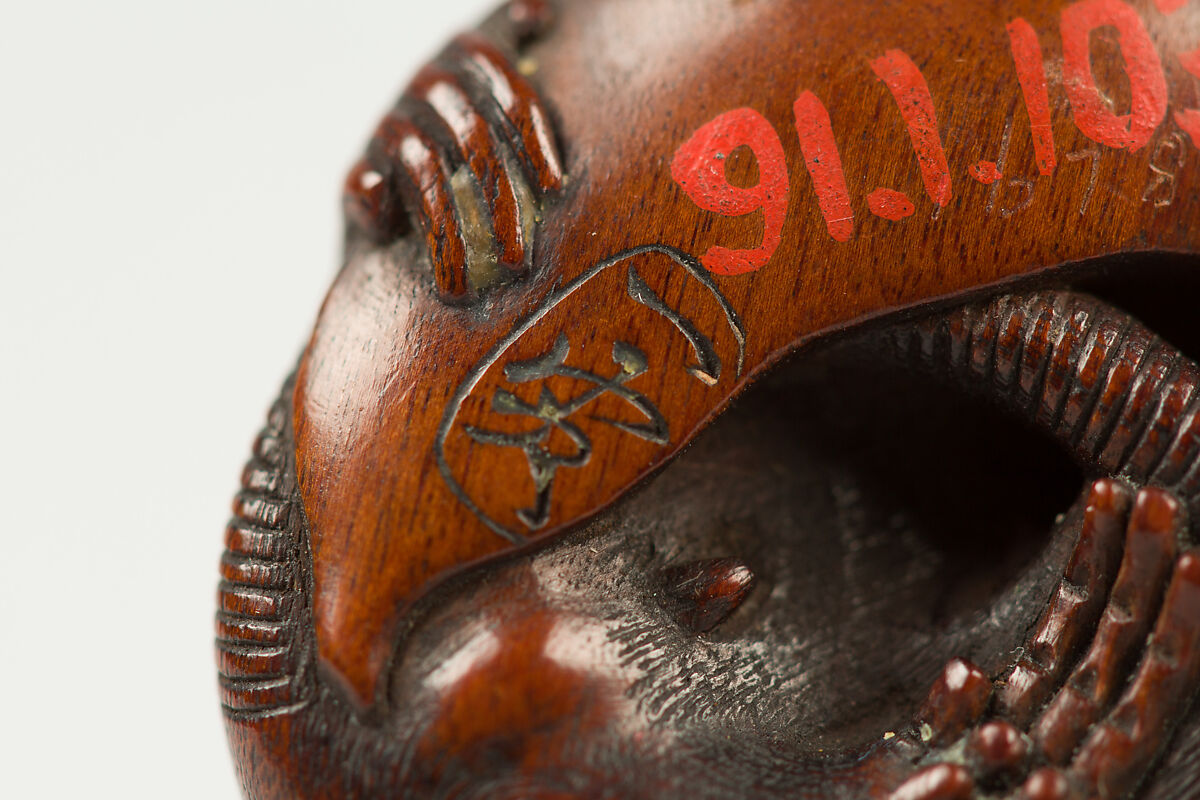 Netsuke of a Rat Grasping a Soybean Pod, Wood, Japan
