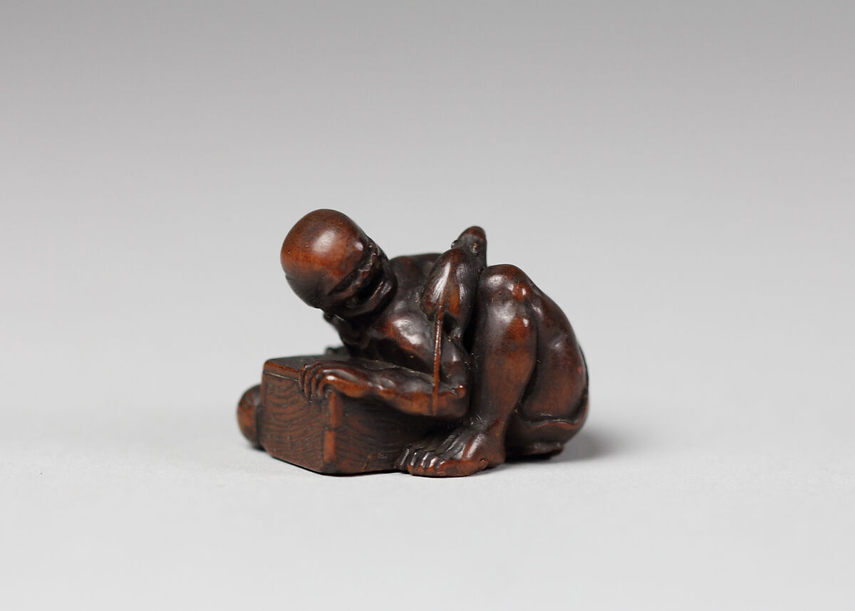 Netsuke of Man who Misses Catching a Rat, Wood, Japan 