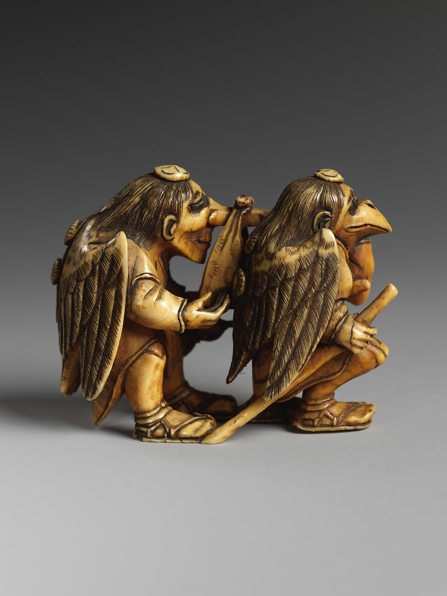 Two Mythical Creatures (Tengu) Carrying a Parcel, Ivory, Japan 