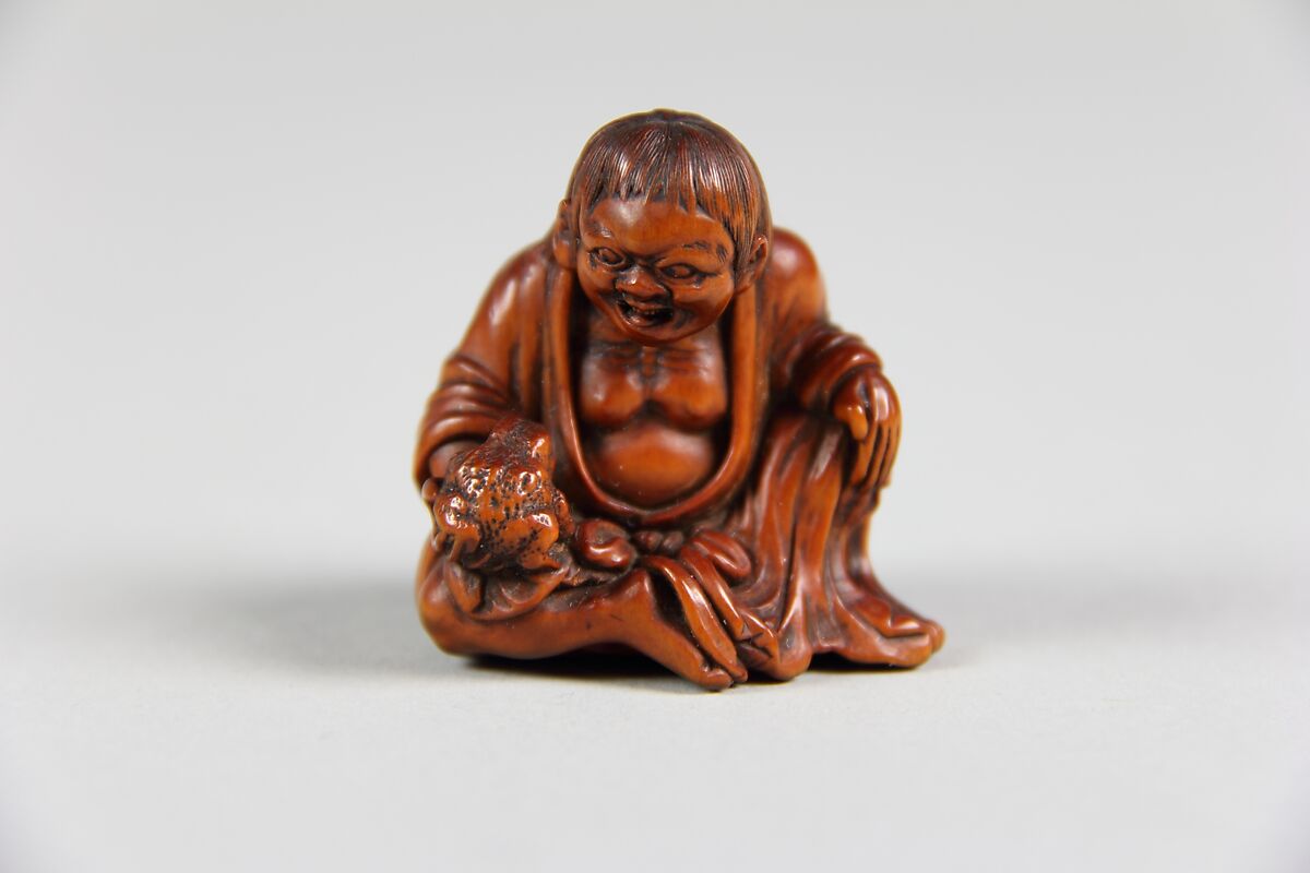 Netsuke of Old Woman with a Toad in her Hand (Gama Sennin), Wood, Japan 