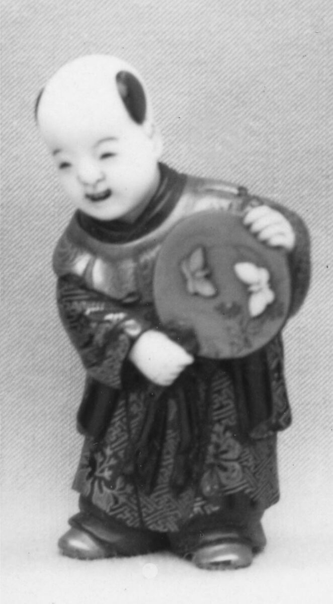 Netsuke of Boy with a Fan, Lacquered; head of ivory, Japan