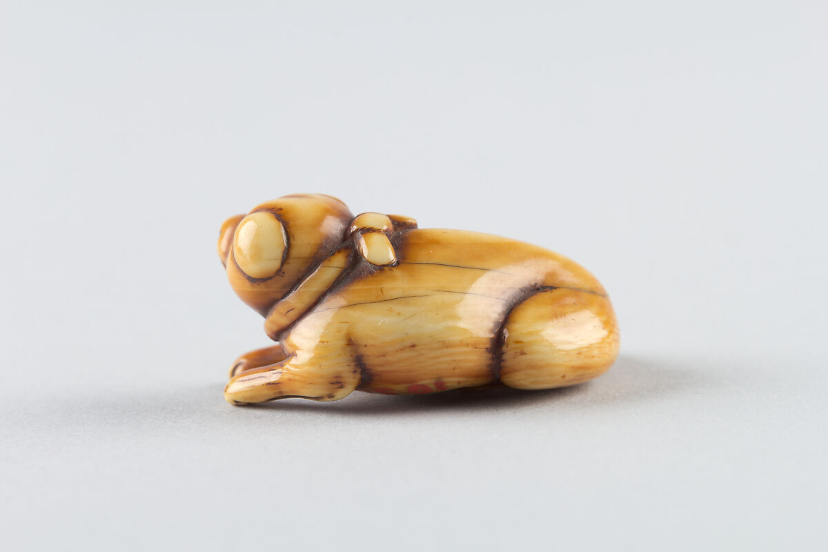 Netsuke of puppy, Ivory, Japan