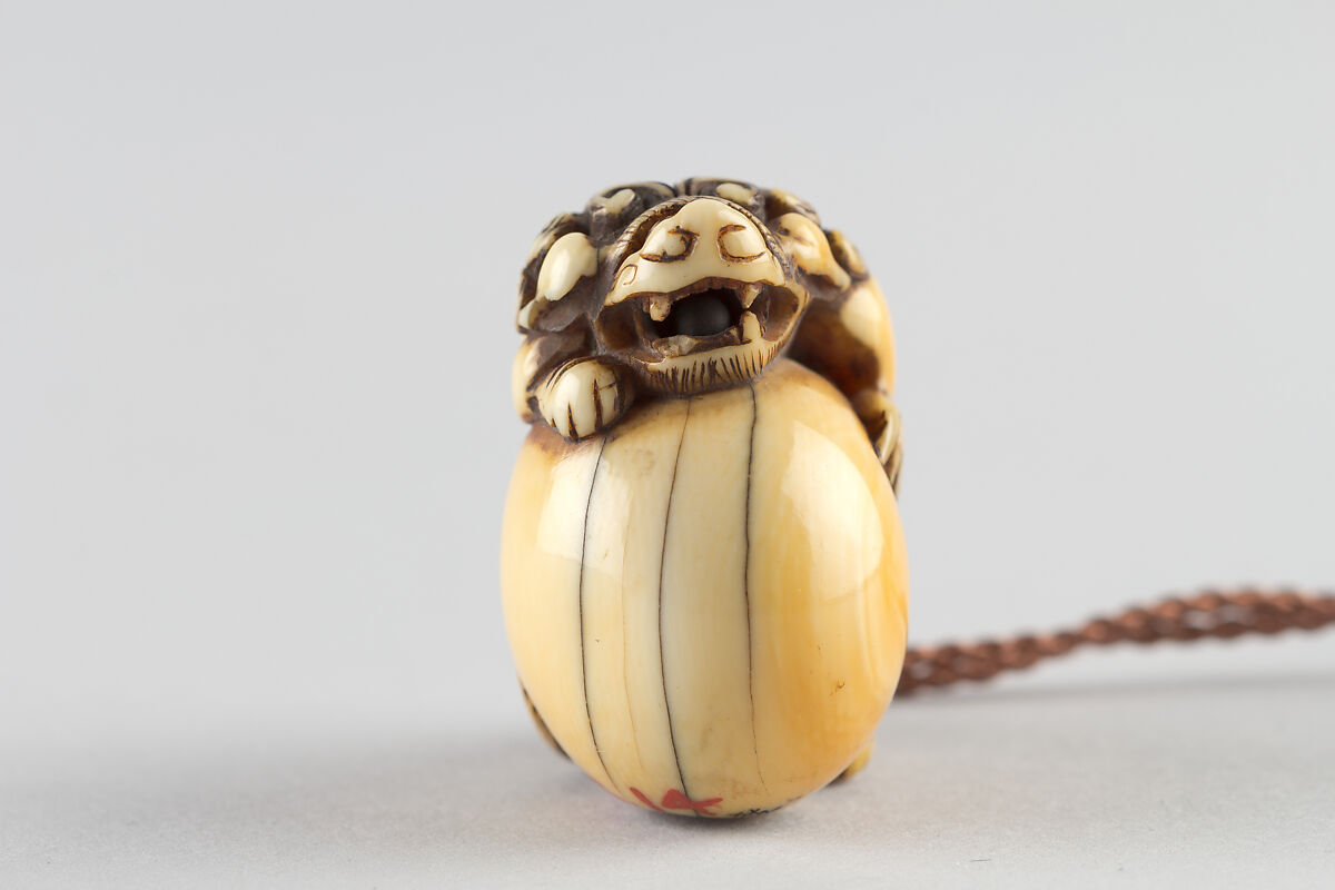 Netsuke in the Shape of a Lion with a Ball, Ivory, Japan