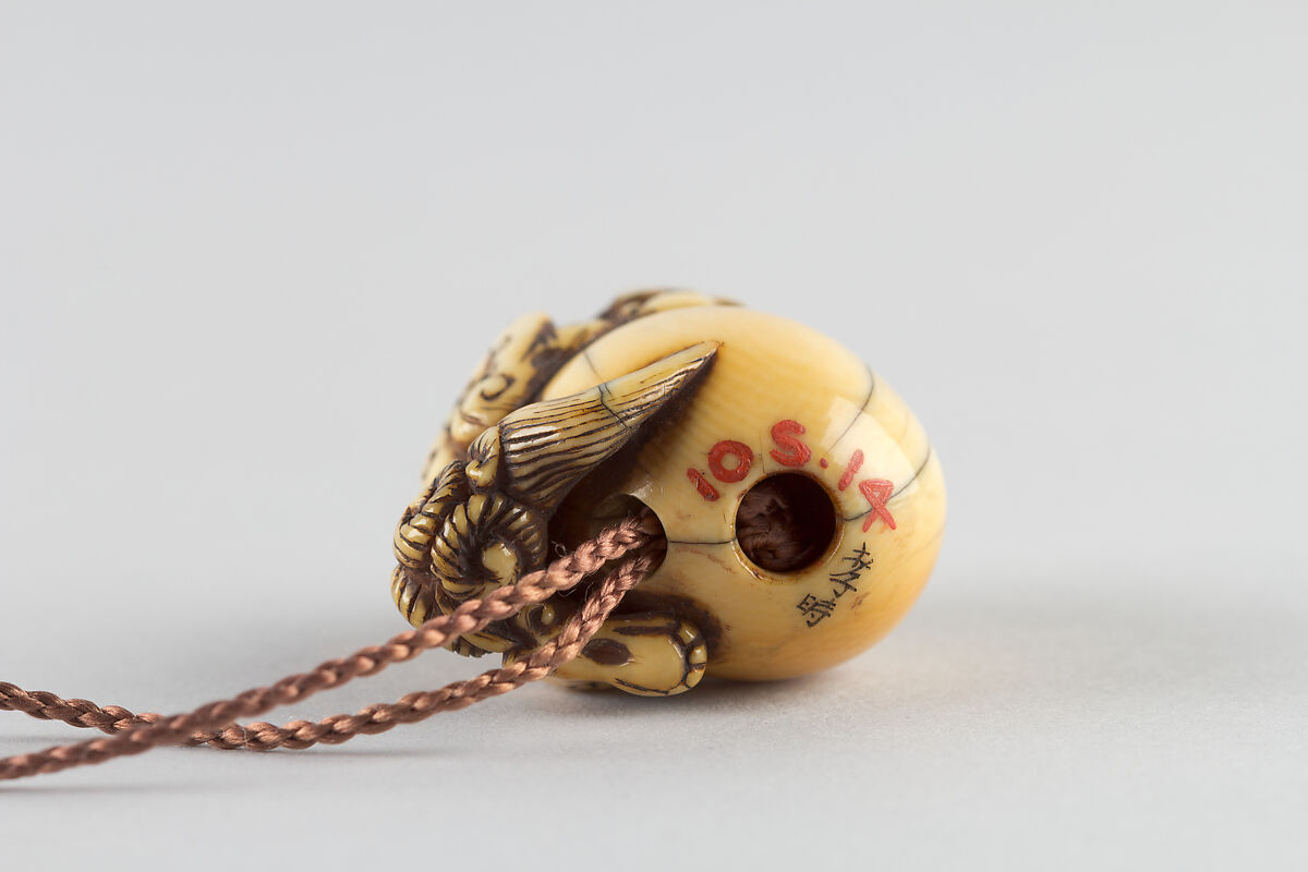 Netsuke in the Shape of a Lion with a Ball, Ivory, Japan