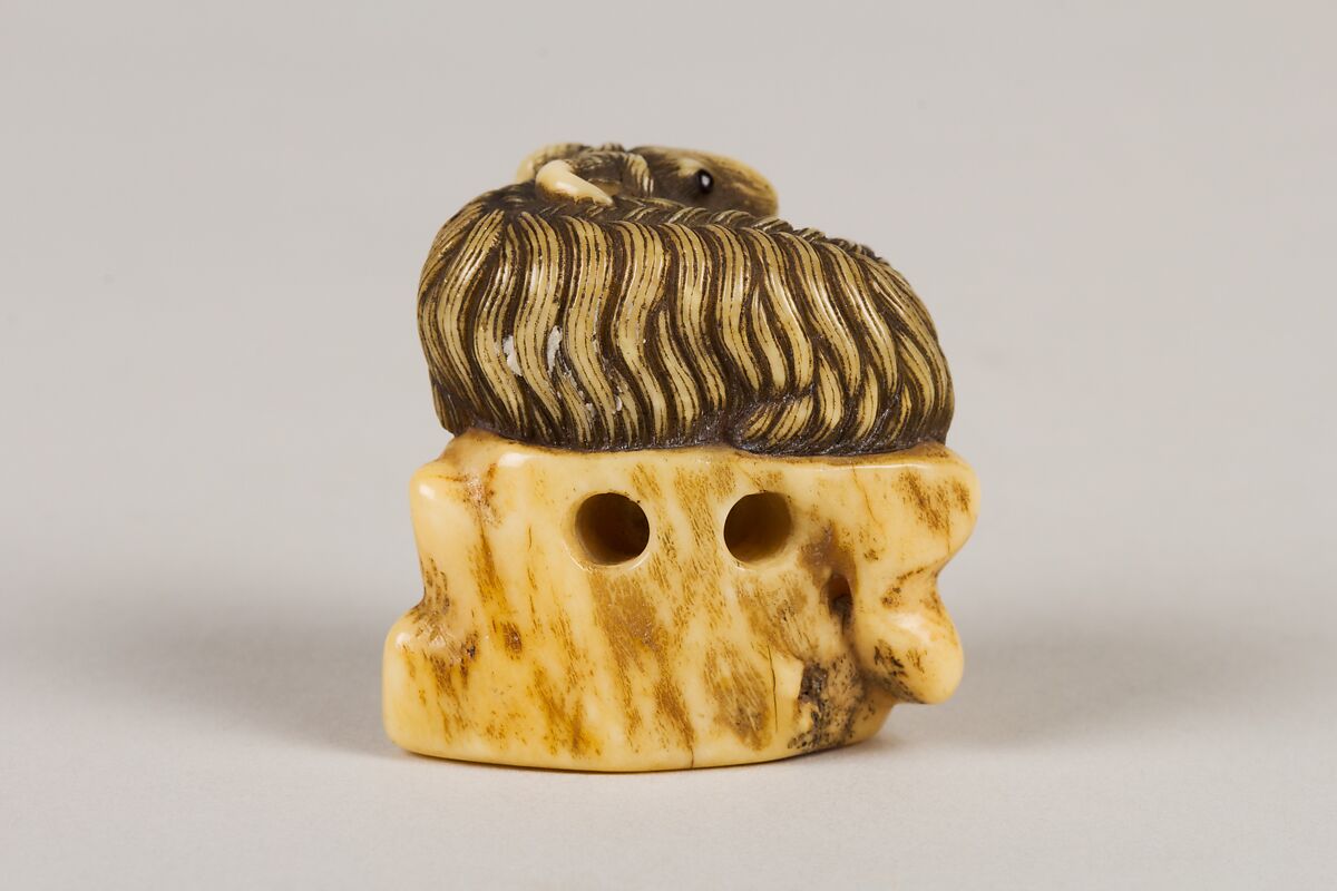 Netsuke of Goat on a Rock, Ivory, Japan