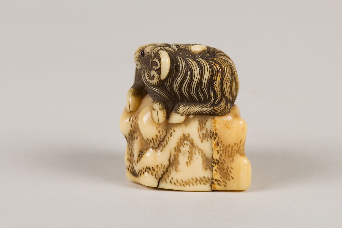 Netsuke of Goat on a Rock, Ivory, Japan