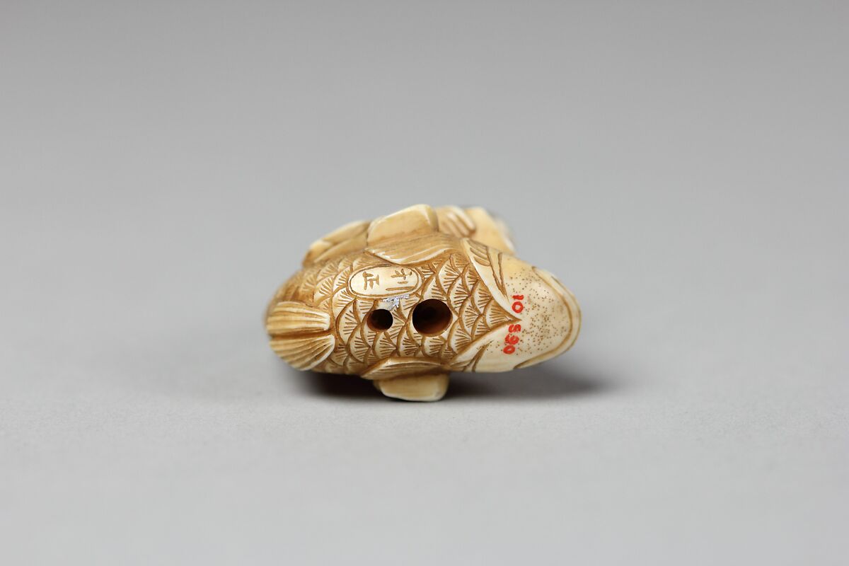 Netsuke of the Sage, Kinkō Carrying a Scroll and Seated on a Carp, Ivory, Japan