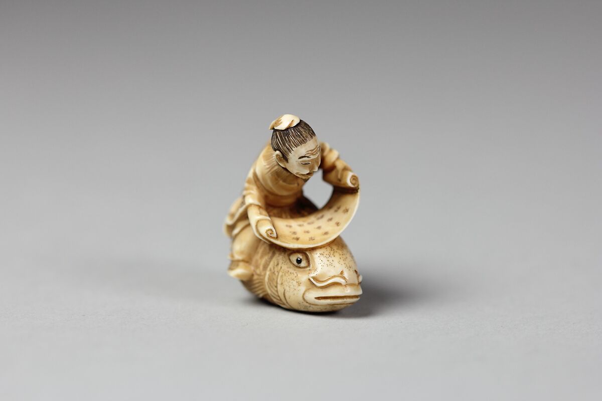 Netsuke of the Sage, Kinkō Carrying a Scroll and Seated on a Carp, Ivory, Japan 