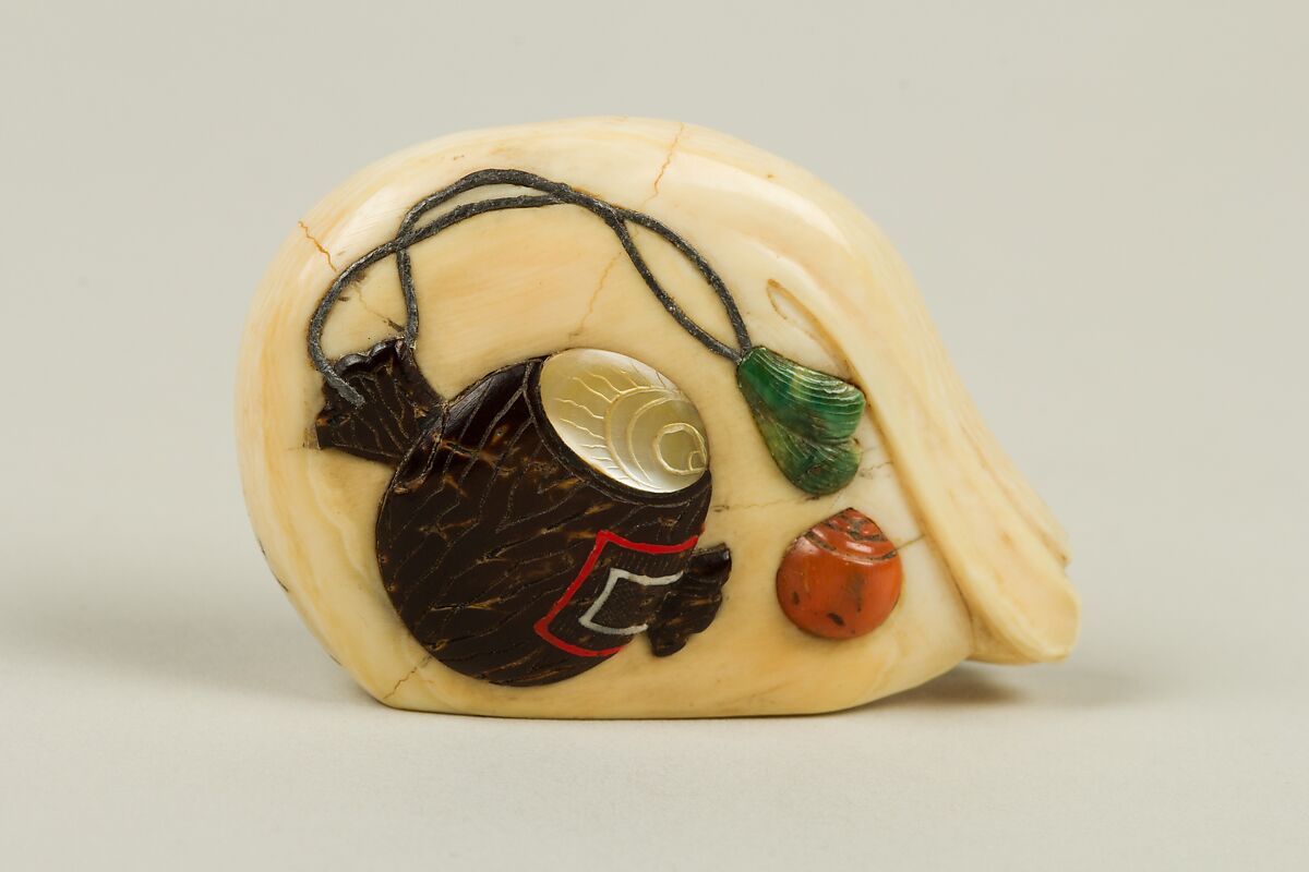 Netsuke of Daikoku with Mallet and Bag, Ivory inlaid with various colored stones, Japan 