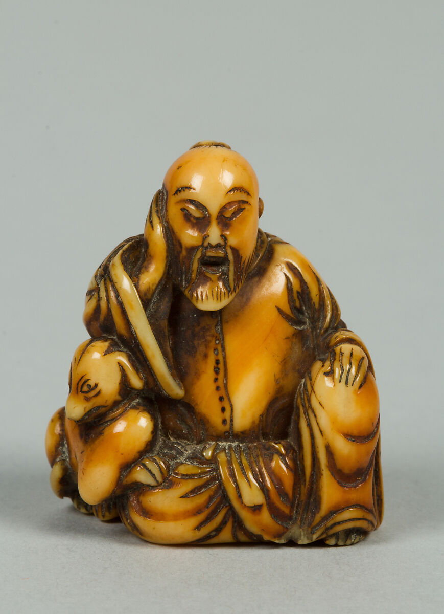 Netsuke of Seated Figure of Old Man with a Dog, Ivory, Japan 