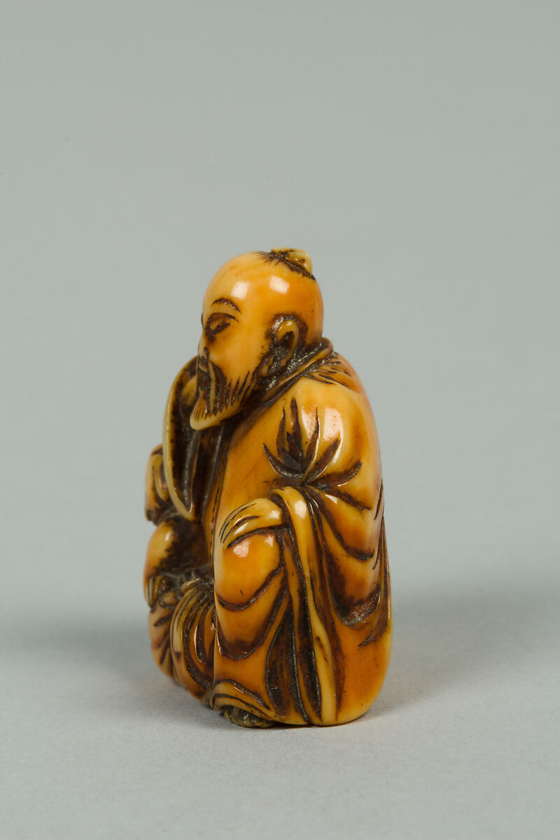 Netsuke of Seated Figure of Old Man with a Dog, Ivory, Japan
