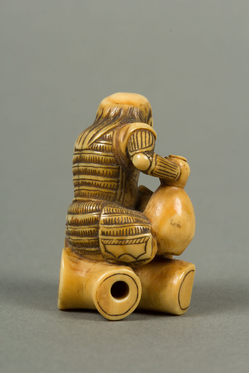 Netsuke of Man Sitting on a Log holding a Bottle and a Cup, Ivory, Japan