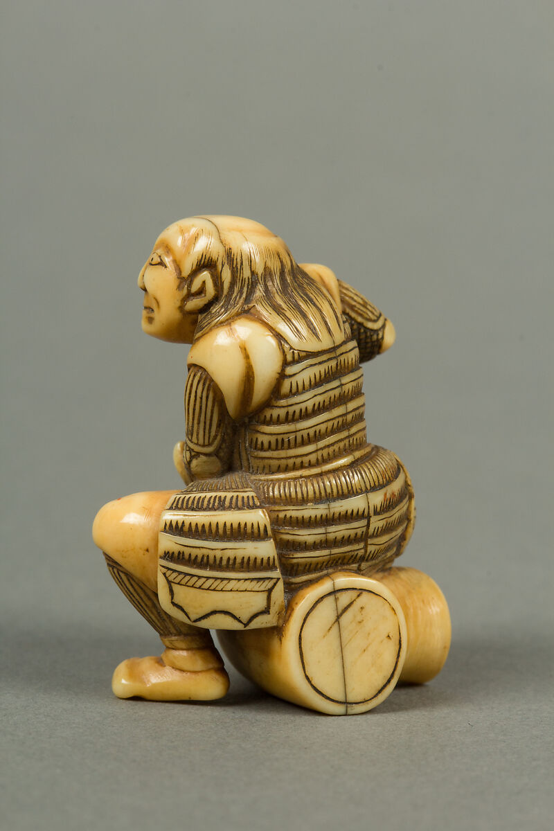Netsuke of Man Sitting on a Log holding a Bottle and a Cup, Ivory, Japan