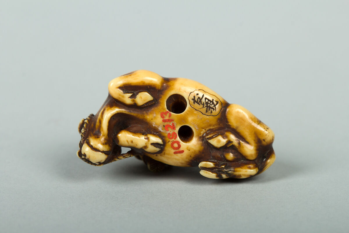 Netsuke of Man Sitting on a Recumbent Ox, Ivory, Japan
