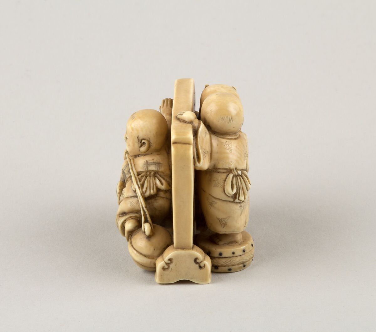 Netsuke of Three Boys Playing around a Screen, Ivory, Japan