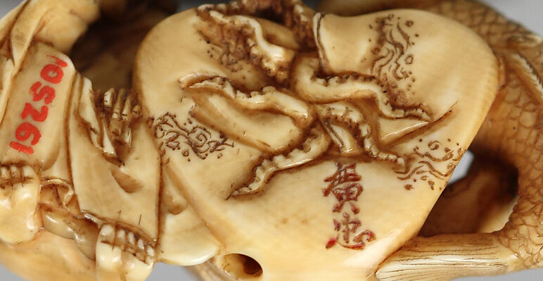 Netsuke of Daruma Admonishing a Mermaid Serving Sake to an Octopus, Ivory, Japan