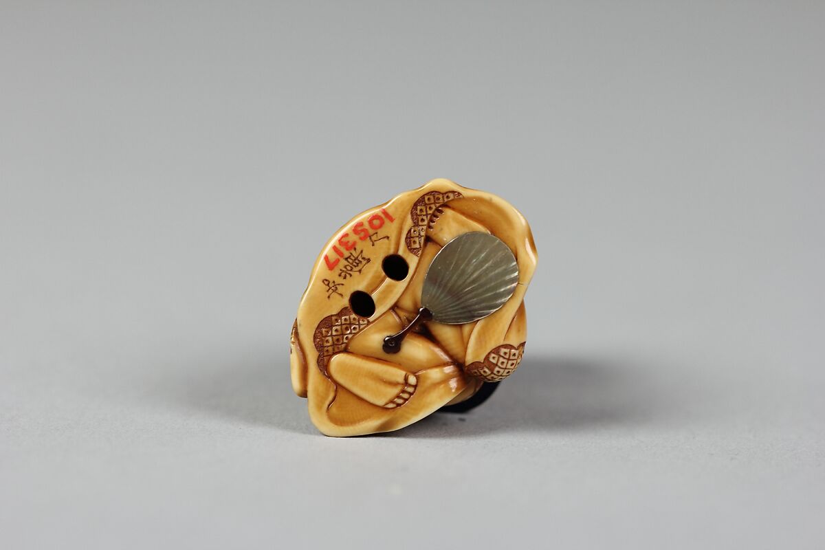 Netsuke of Girl at her Toilet, Ivory, Japan