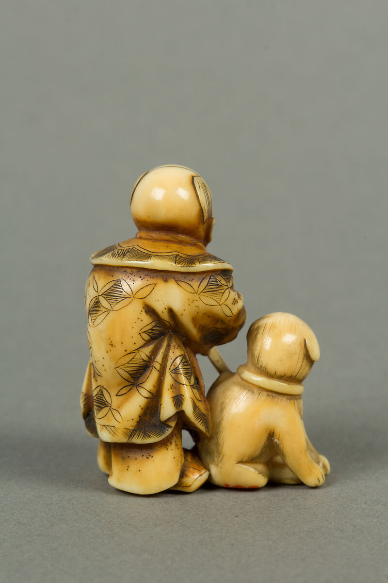 Netsuke of Boy with a Dog, Ivory, Japan