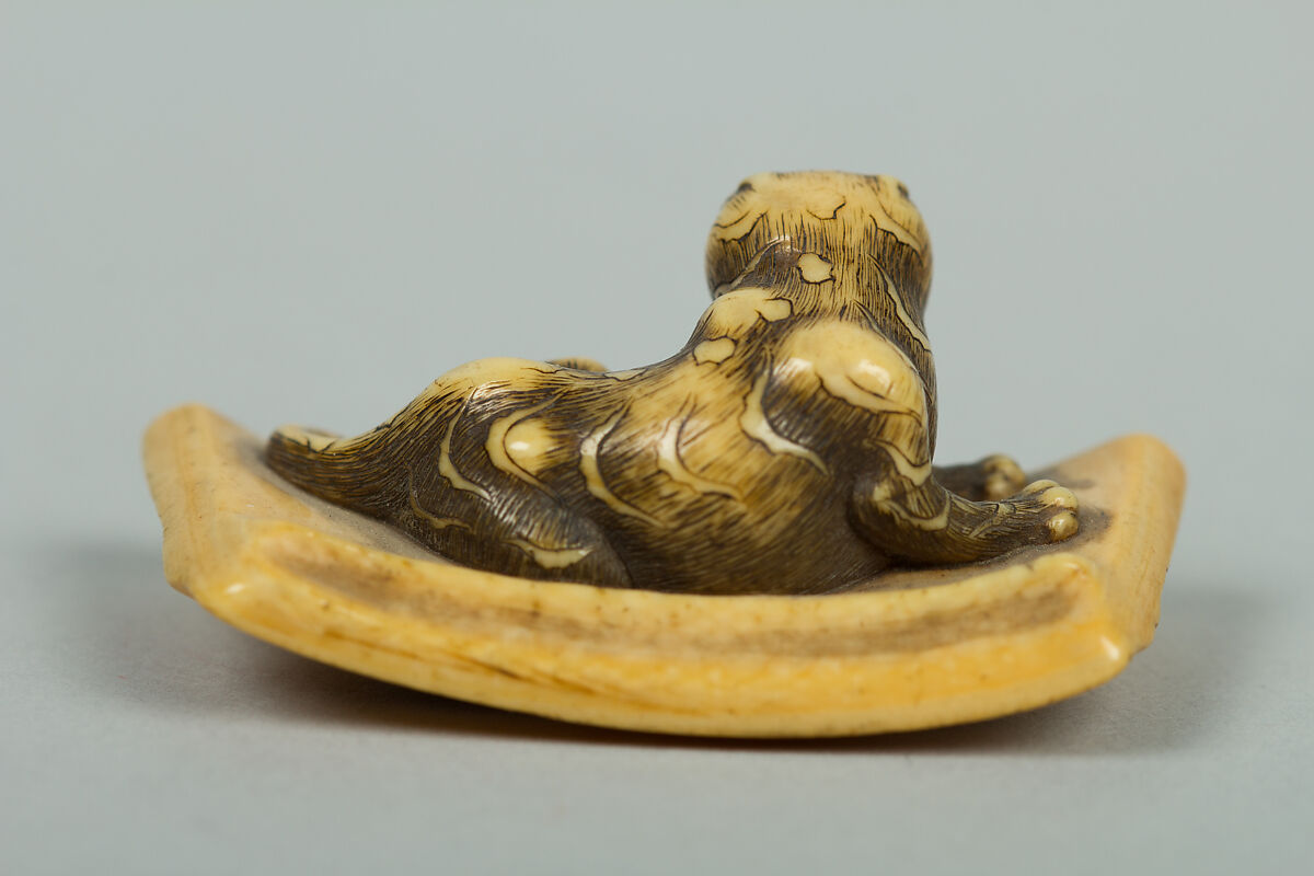 Netsuke of Tiger Lying on a Mat, Ivory, Japan