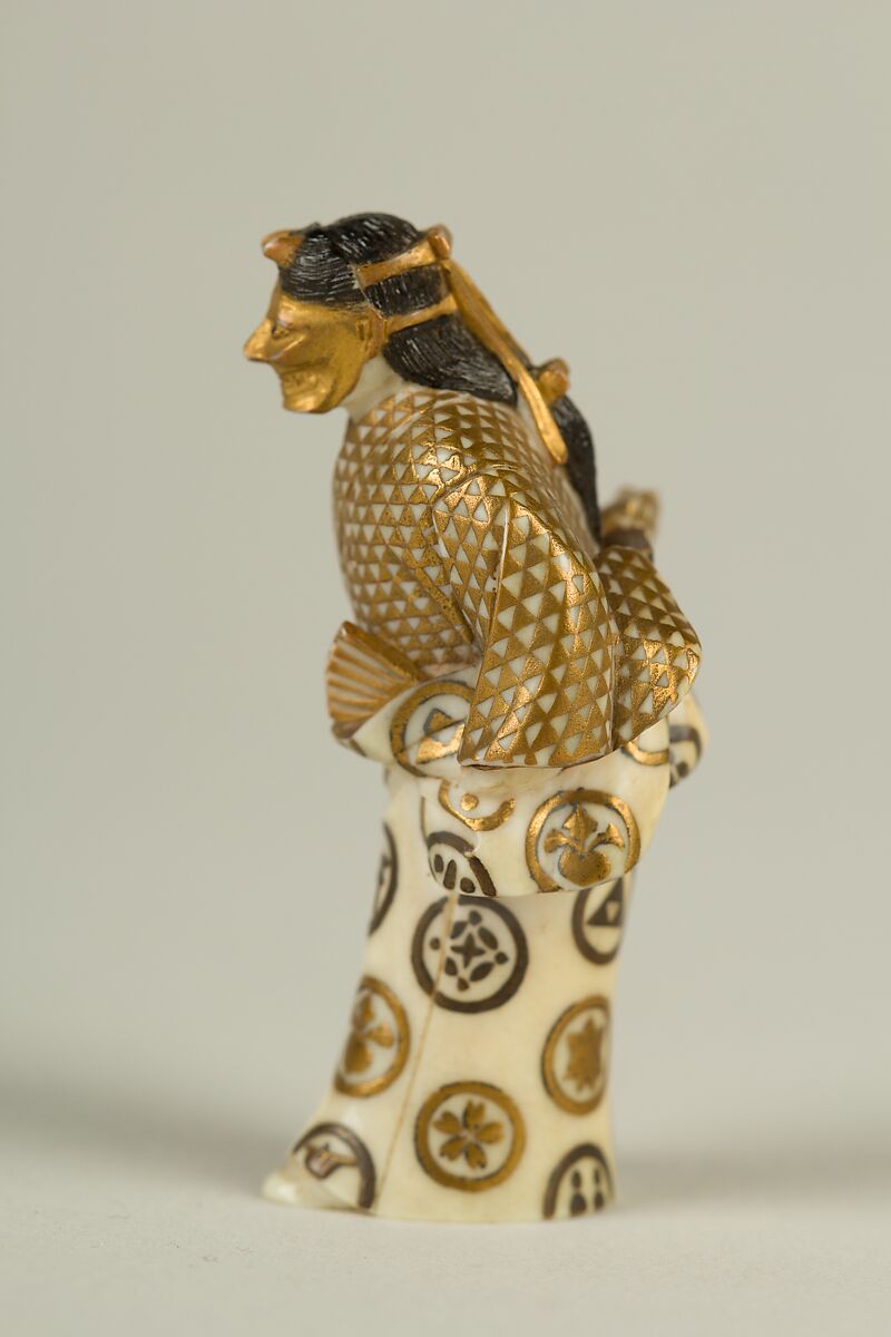 Netsuke of an Actor, Ivory with gold ornamentation, Japan