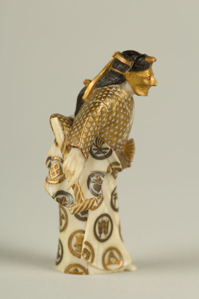 Netsuke of an Actor, Ivory with gold ornamentation, Japan