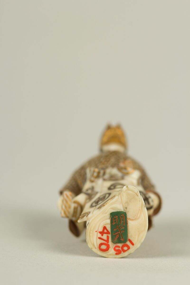 Netsuke of an Actor, Ivory with gold ornamentation, Japan