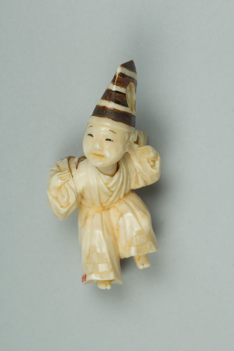 Netsuke, Ivory inlaid with mother-of-pearl and coral, Japan 