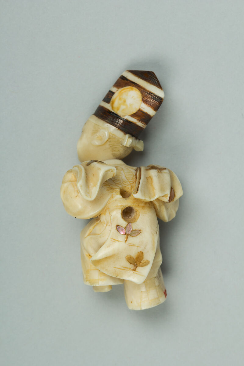 Netsuke, Ivory inlaid with mother-of-pearl and coral, Japan