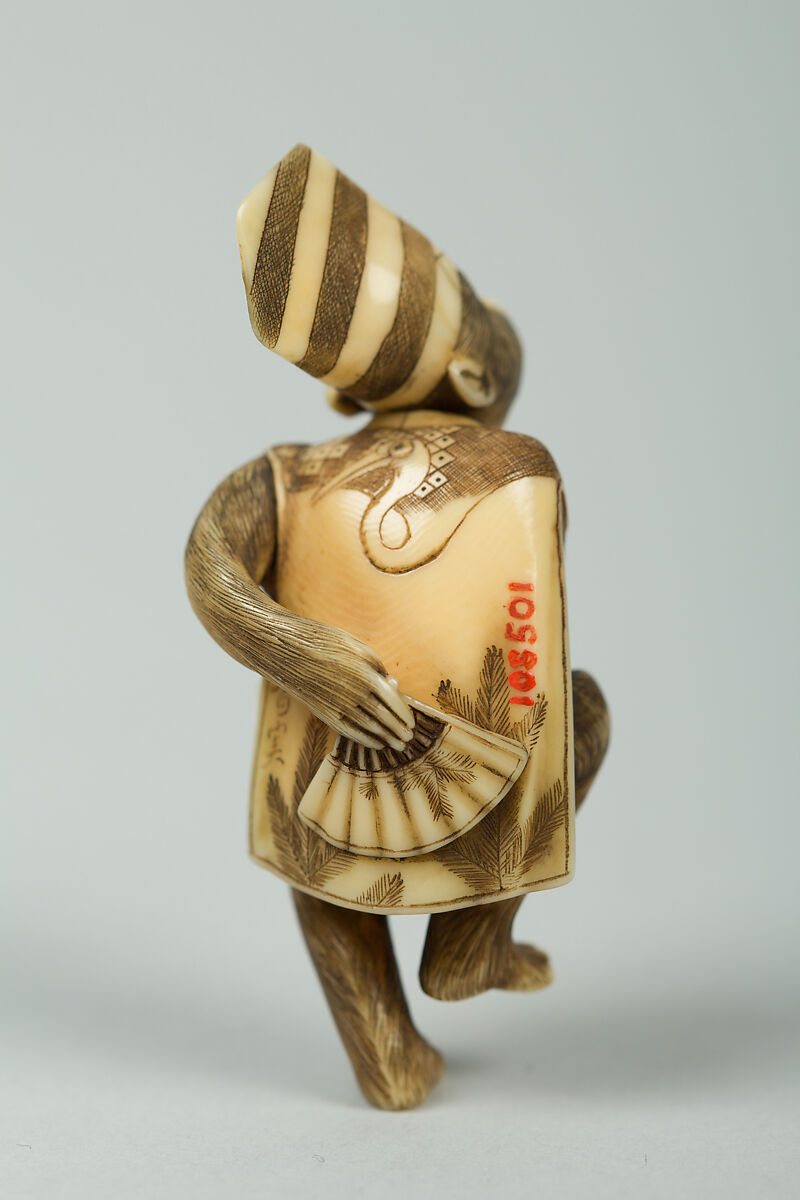 Netsuke of Monkey Wearing a Tall Cap and Carrying a Fan, Ivory, Japan